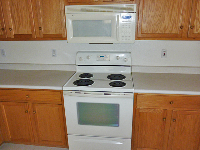 All white appliances, including refrigerator