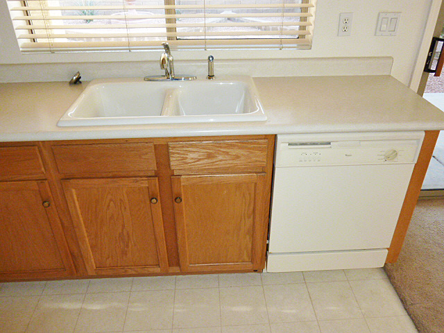 Kitchen sink overlooking backyard