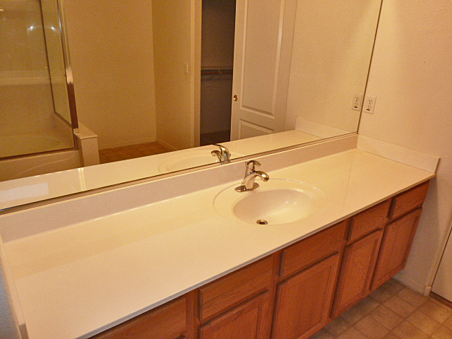 Lots of counter space and storage in master bath